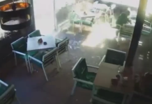 Explozia unui cauciuc de la o mașină de gunoi a distrus fațada unei pizzerii din Târgu Jiu. O femeie a scăpat ca prin urechile acului