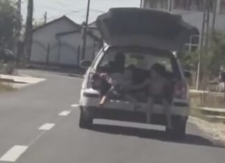 Șofer din Bălești, amendat cu 1.730 de lei pentru că transporta doi copii în portbagaj
